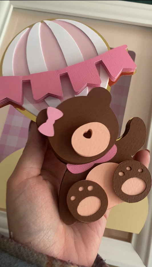 Osita con globo en capas